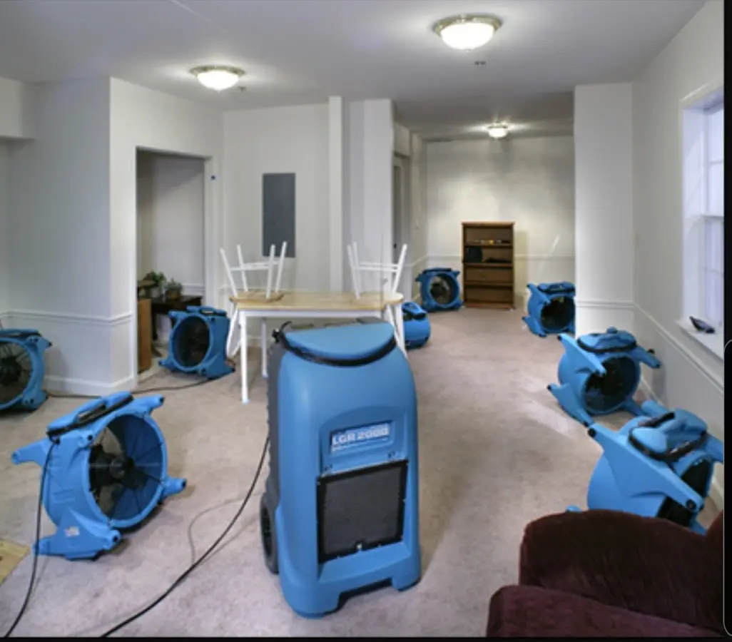 Air movers and dehumidifier setup for Water Damage Restoration in Warrensburg